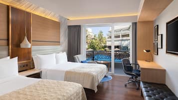 Outdoor pool, open 8:00 AM to 8:00 PM, pool umbrellas