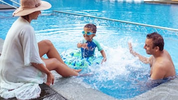 Outdoor pool, open 8:00 AM to 8:00 PM, pool umbrellas