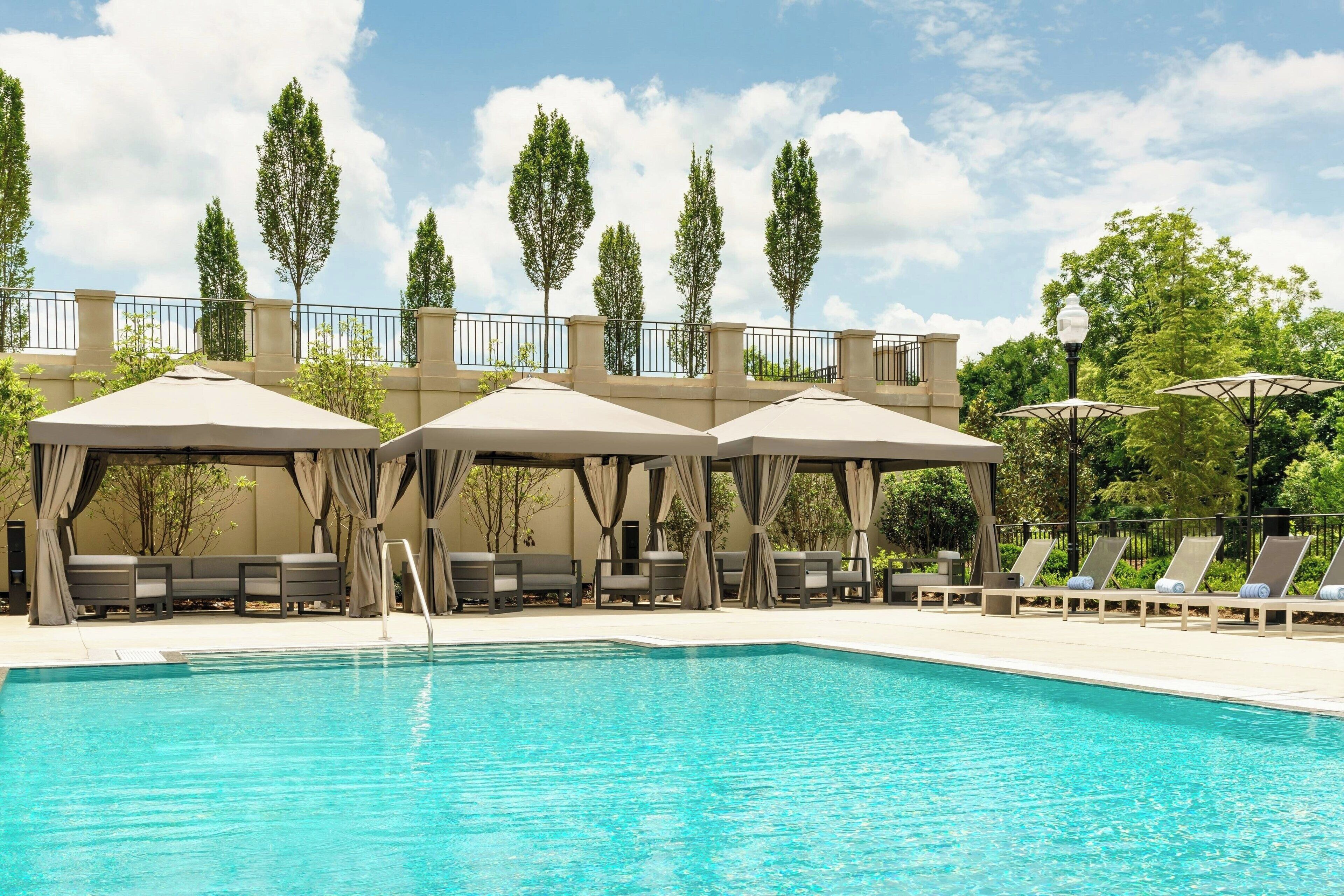 Outdoor pool, free pool cabanas, pool umbrellas