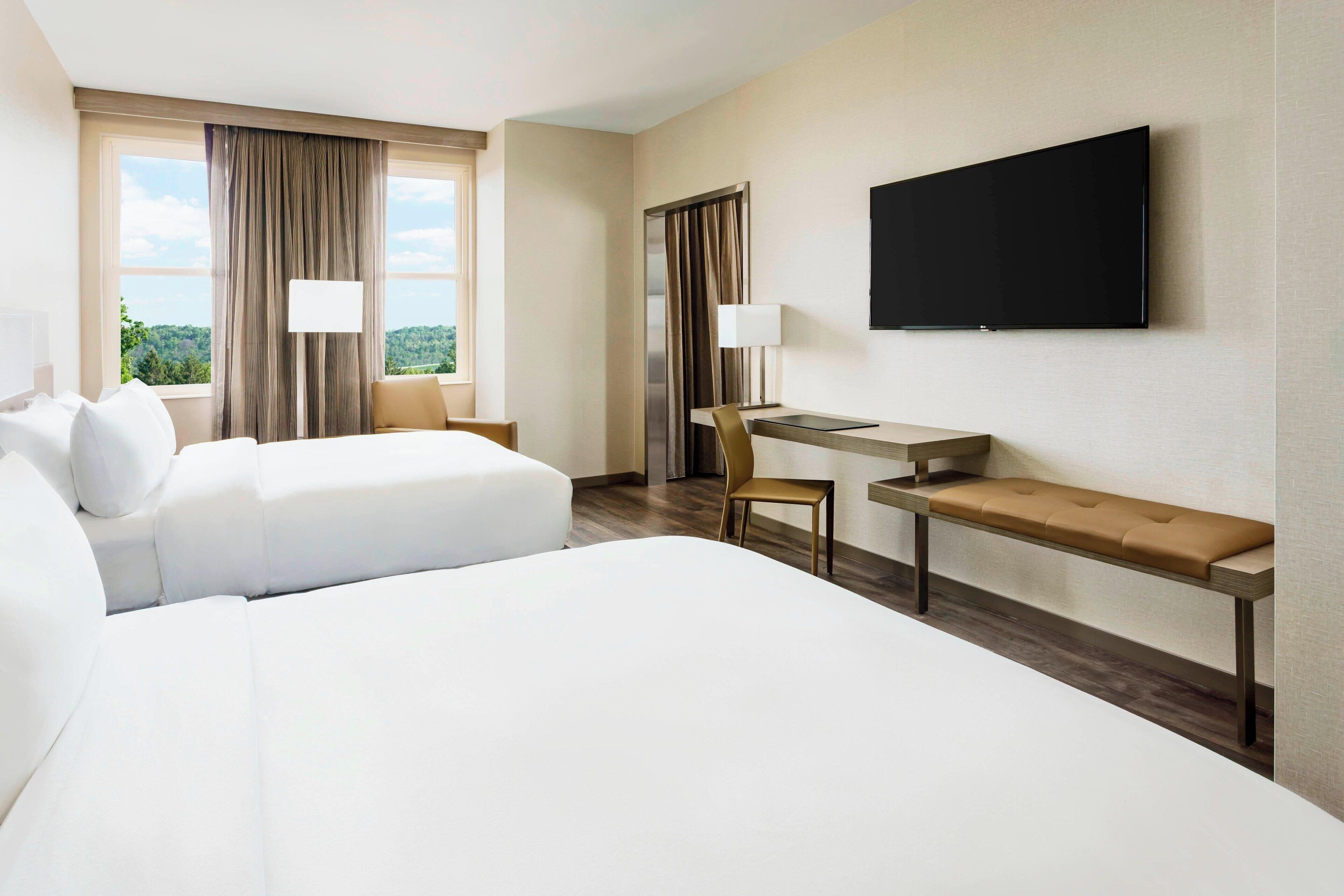 suite, 2 queen beds, corner | in-room safe, desk, blackout curtains, iron/ironing board