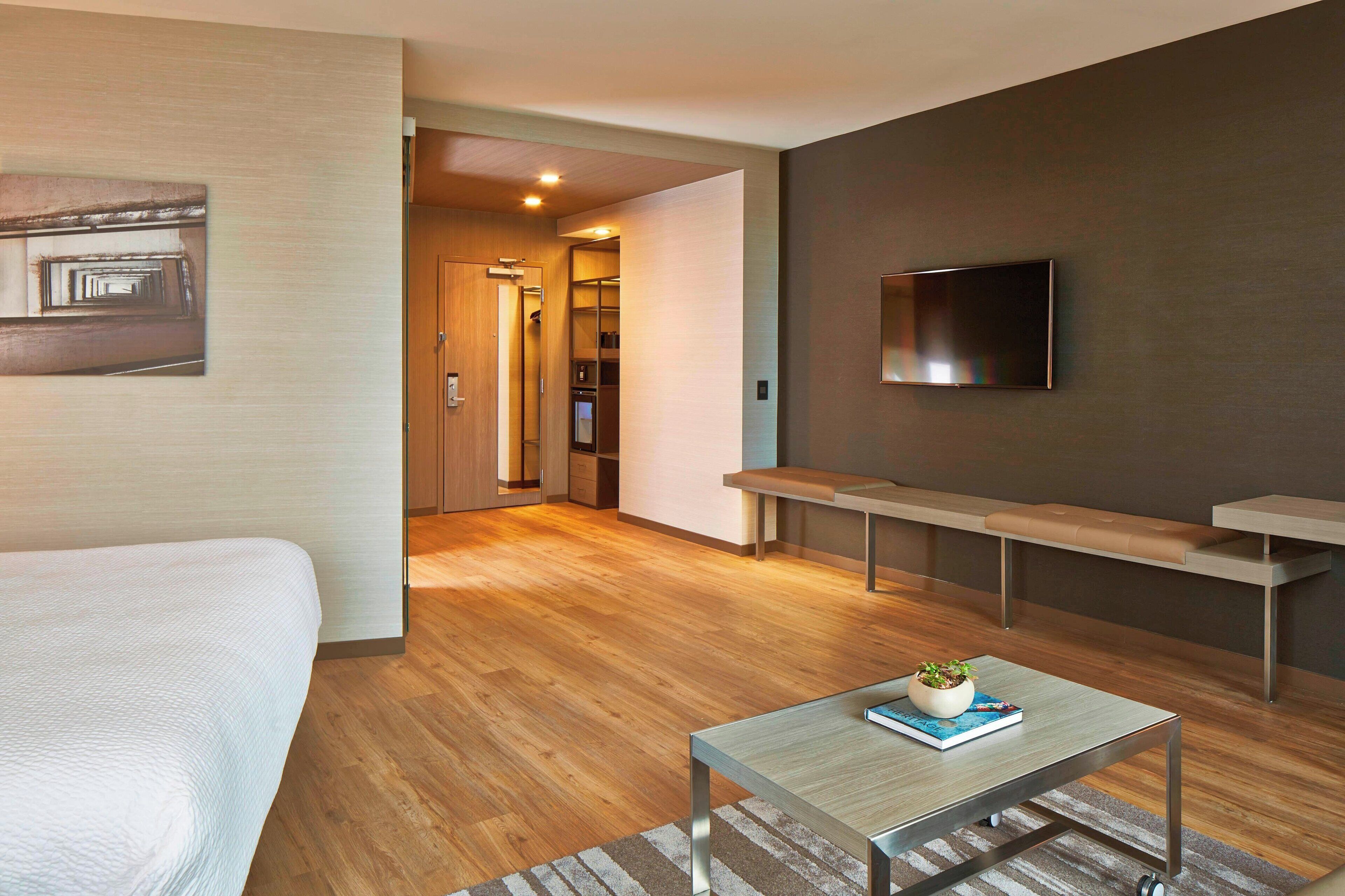 premium bedding, pillow-top beds, desk, laptop workspace