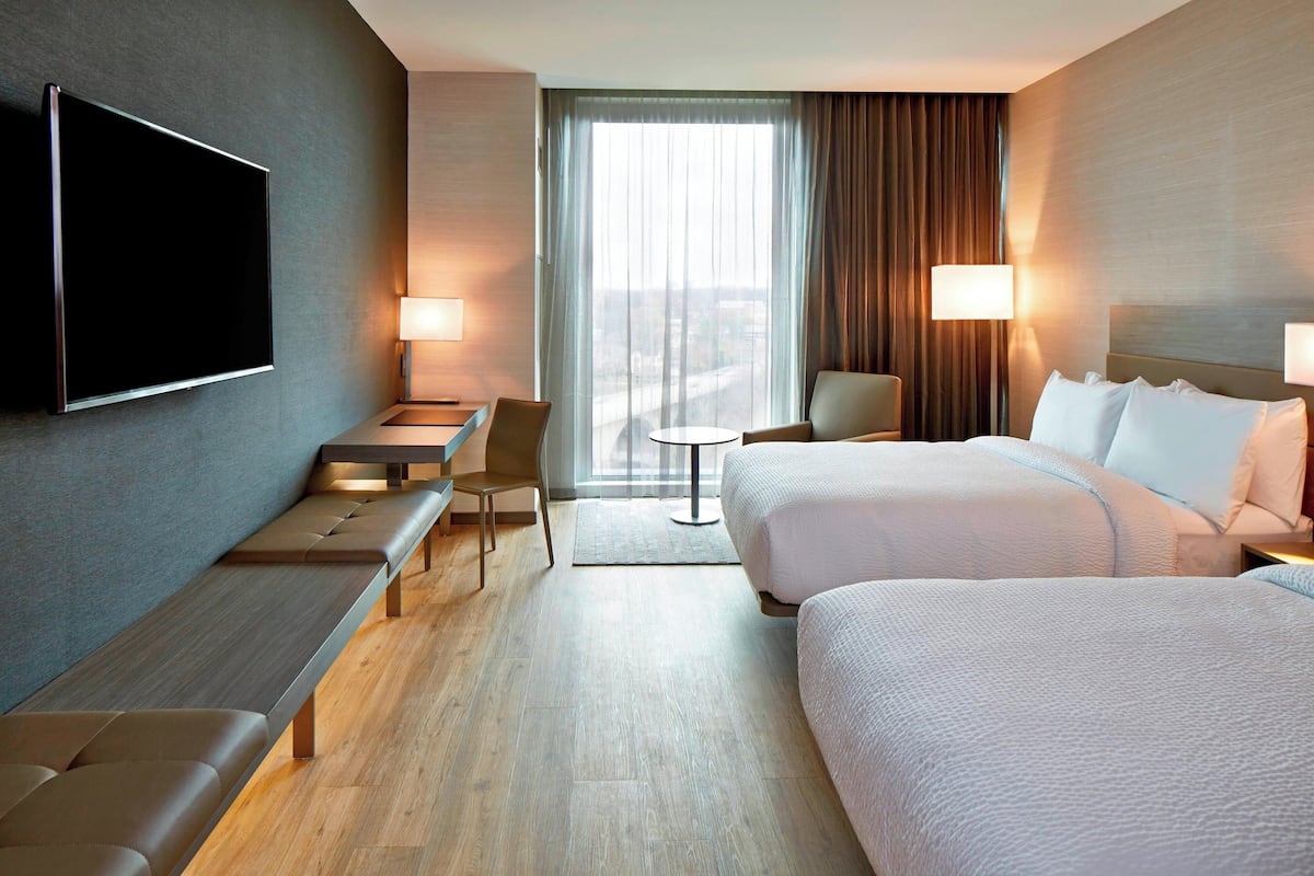 Premium bedding, pillowtop beds, desk, laptop workspace