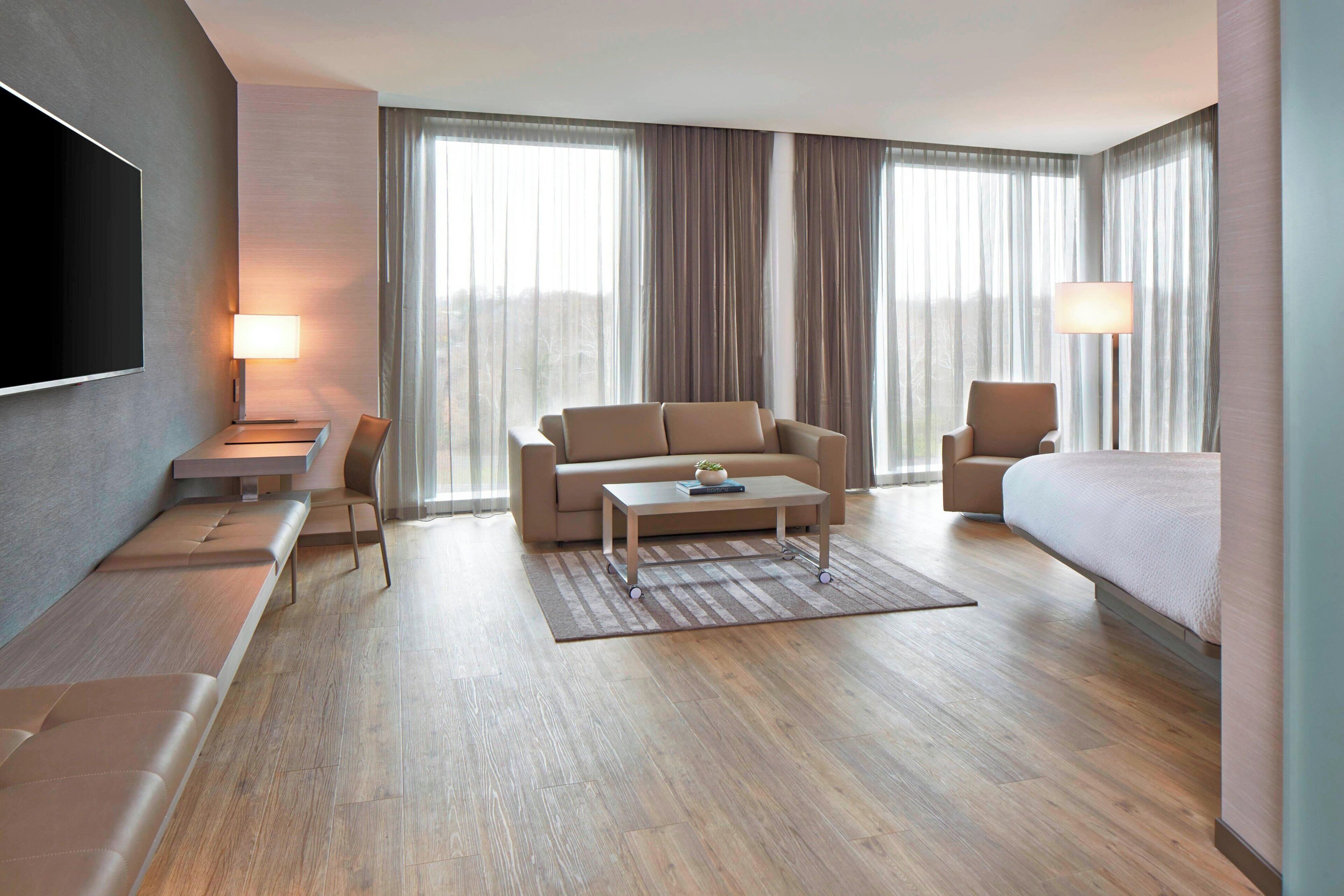 premium bedding, pillow-top beds, desk, laptop workspace