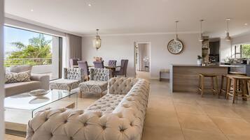 Penthouse ( | Living area | Flat-screen TV