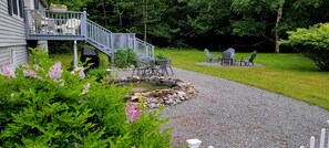 Outdoor dining - Quiet location. Home is 1/2 a mile to Seawall Beach and 3 miles to town center. (Southwest Harbor)