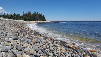 Quiet location. Home is 1/2 a mile to Seawall Beach and 3 miles to town center.