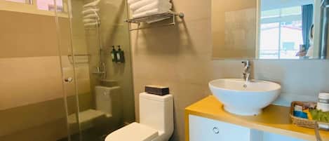 Shower, free toiletries, hair dryer, slippers