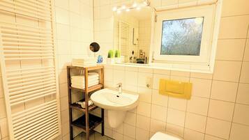 Shower, free toiletries, hair dryer, towels