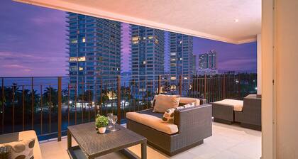 Colorful Beachfront oceanview condo. Large balcony