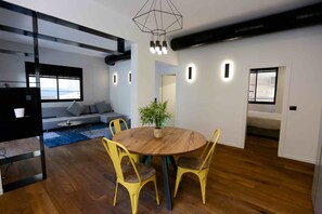 Design Apartment, 2 Bedrooms, Balcony | In-room dining - Holyguest - Gordon 25 (Tel Aviv)
