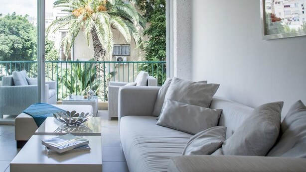Classic Apartment, 2 Bedrooms, Terrace | Living area | TV - Holyguest - Adam Hacohen (Tel Aviv)