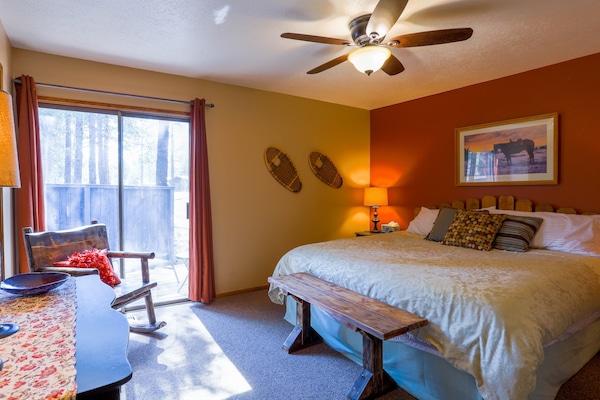 Bedroom #1- Spacious Main floor bedroom with a King size bed & walk in closet