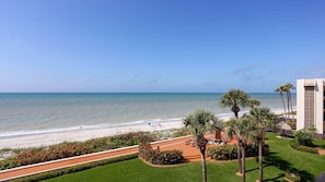 On the beach, sun loungers, beach towels