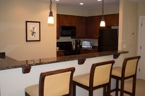 Microwave, dishwasher, coffee/tea maker, cookware/dishes/utensils