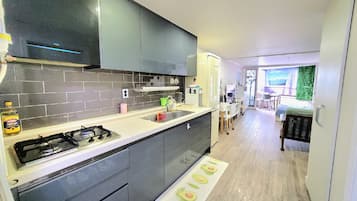 Royal Duplex, 2 Bedrooms, Lake View, Lakeside | Private kitchen | Fridge, microwave, rice cooker, cookware/dishes/utensils