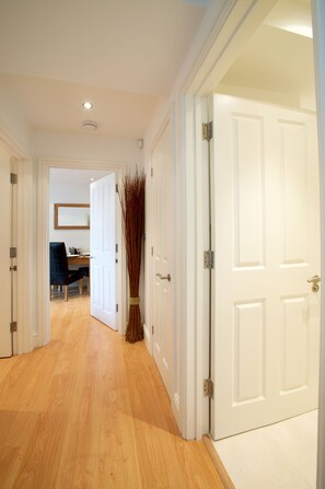 Apartment, 2 Bedrooms | Living area | 30-inch flat-screen TV with satellite channels, TV, DVD player