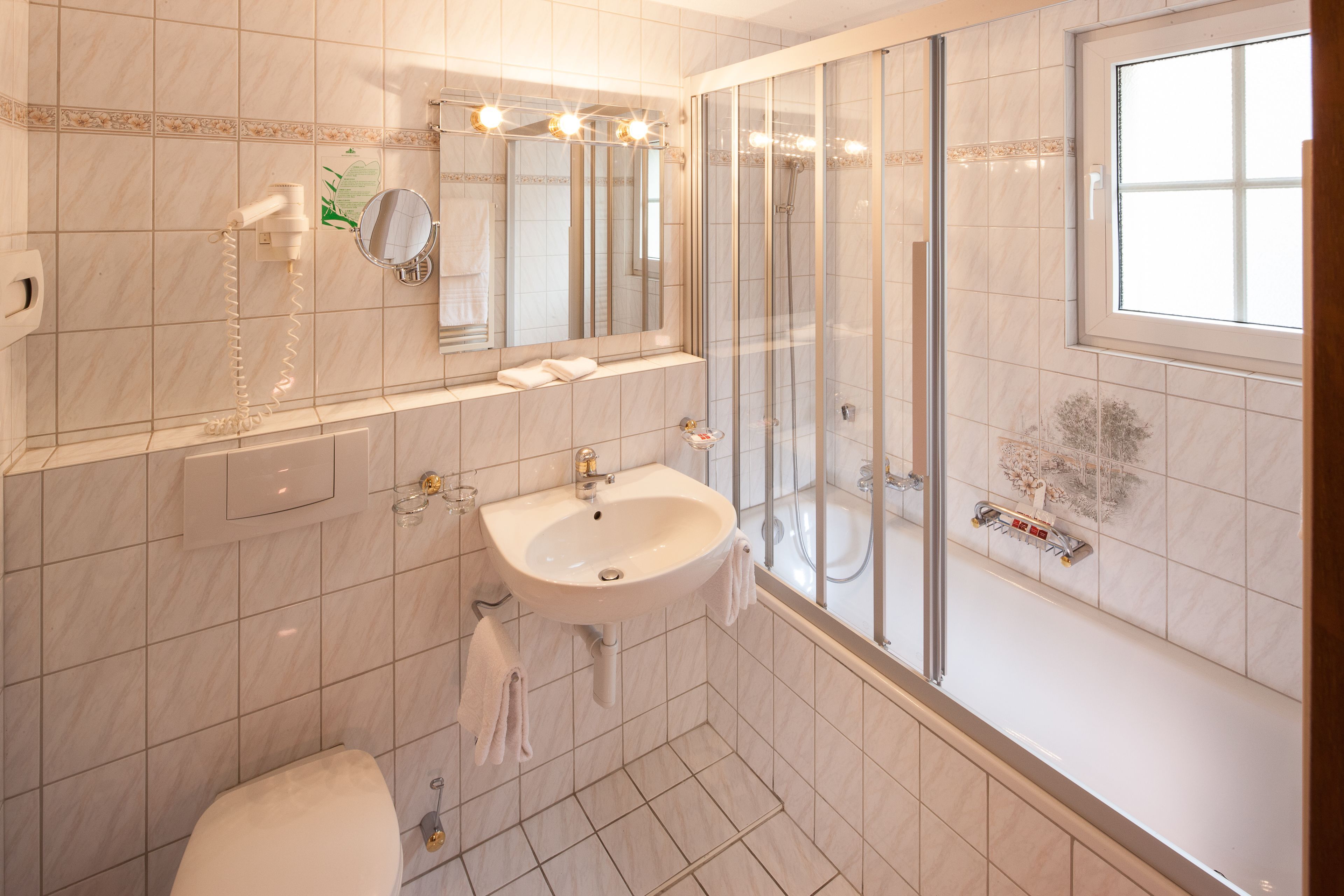 comfort single room | bathroom | free toiletries, hair dryer, towels