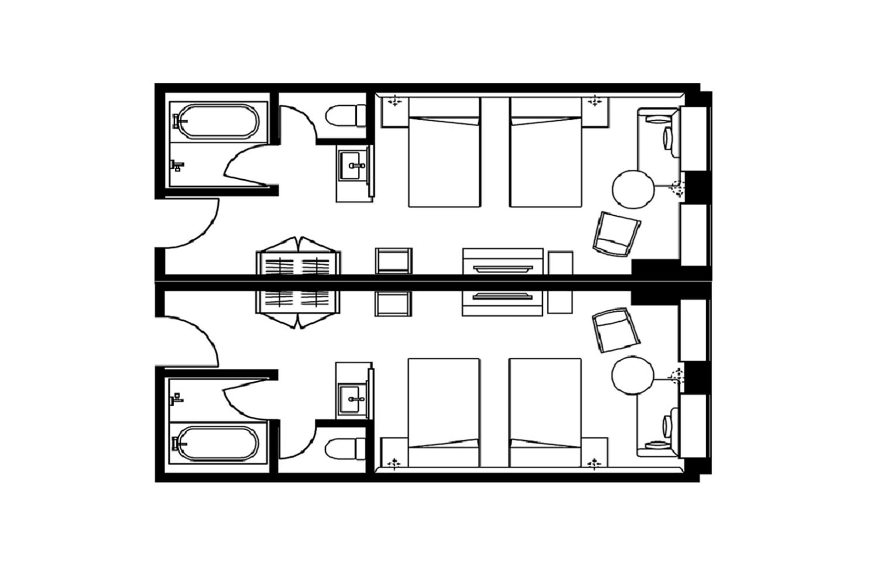 A floor plan of a hotel room with a bathroom, a desk, a bed, and a small seating area.