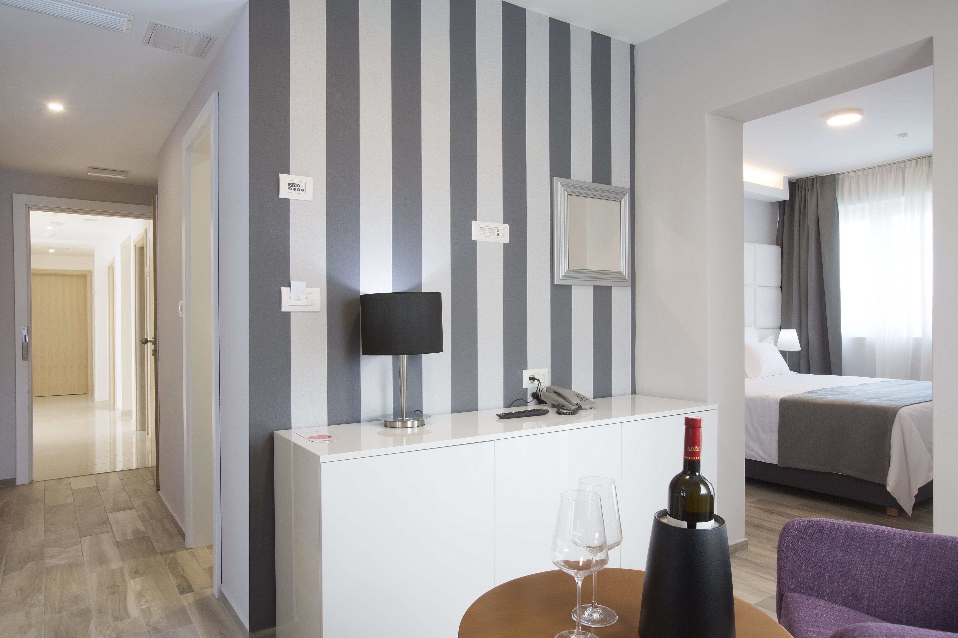 superior double or twin room, terrace | living area | flat-screen tv, books, stereo