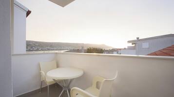 Premium bedding, down duvets, Select Comfort beds, minibar