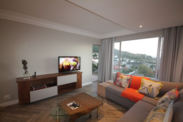 Apartment (2 Bedrooms) | Living room | Flat-screen TV