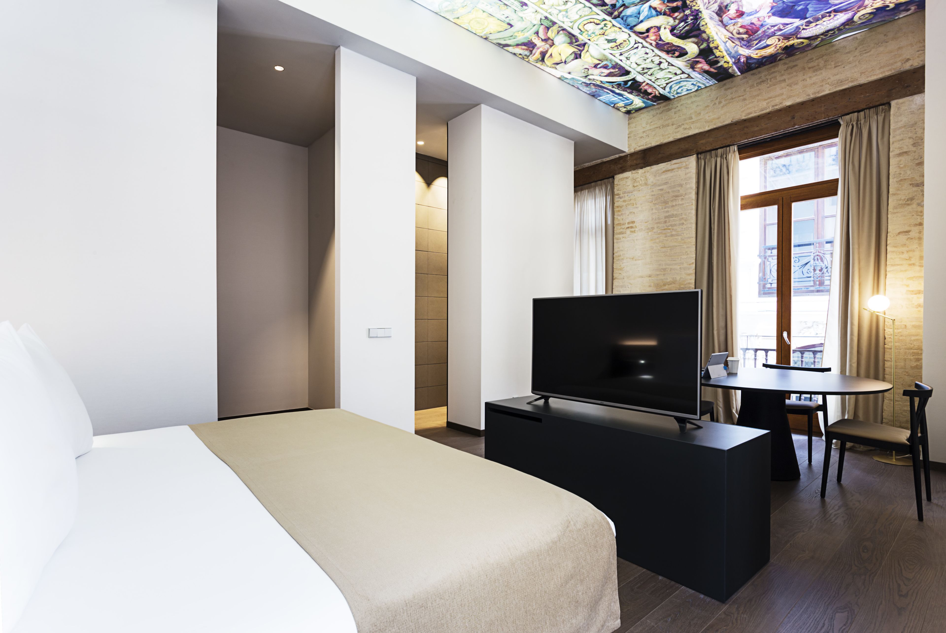 junior suite | minibar, in-room safe, desk, blackout curtains