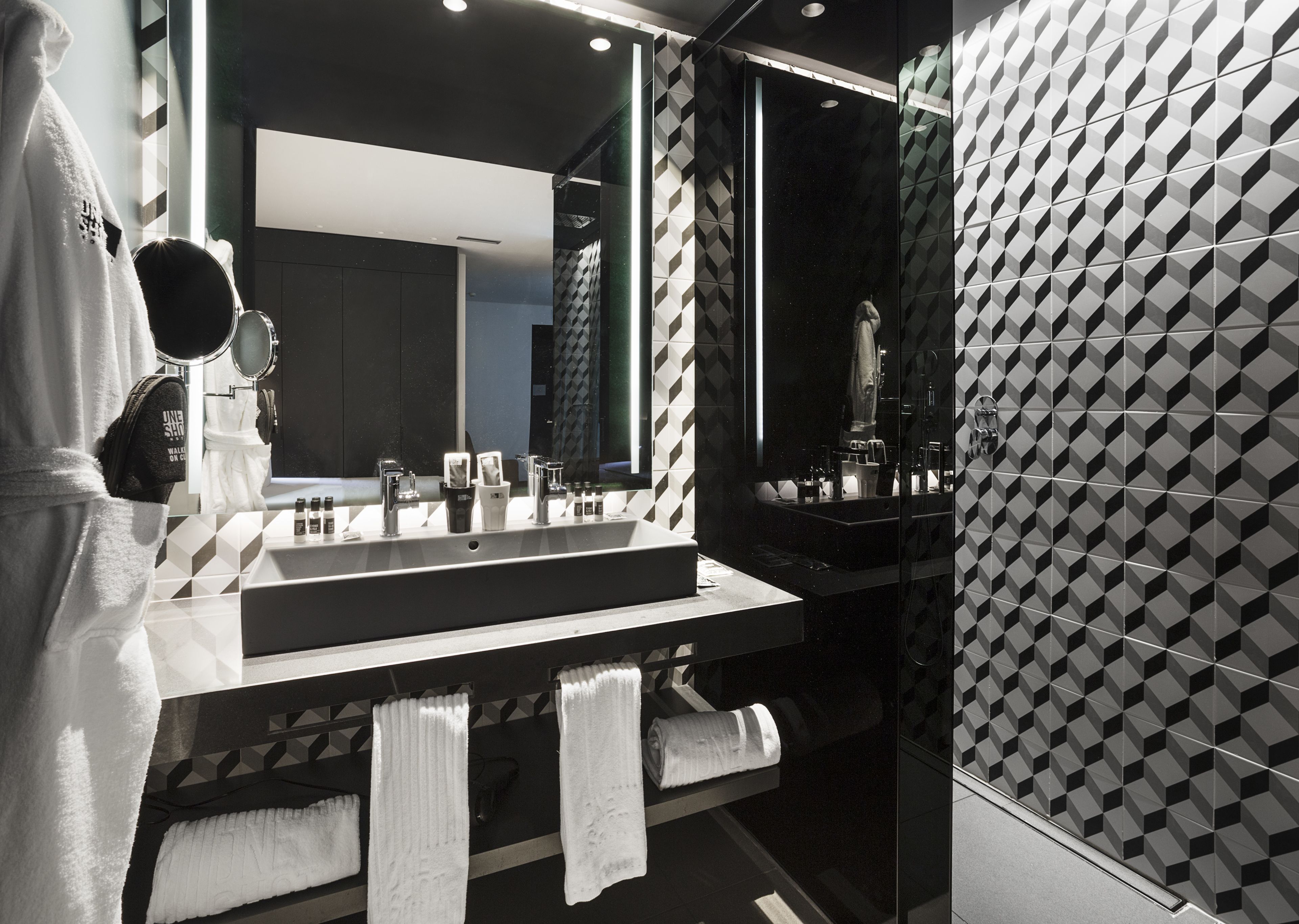 standard suite | bathroom | shower, rainfall showerhead, free toiletries, hair dryer