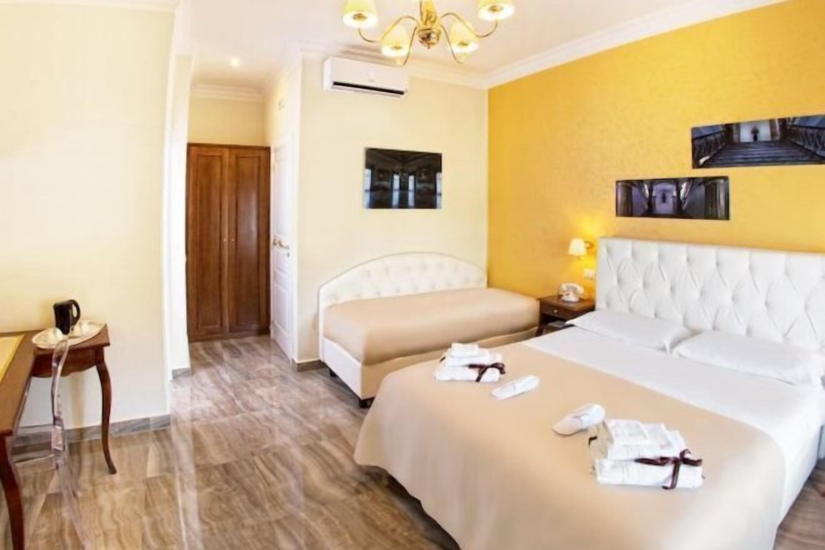 Ropa de cama de alta calidad, minibar, caja fuerte y escritorio