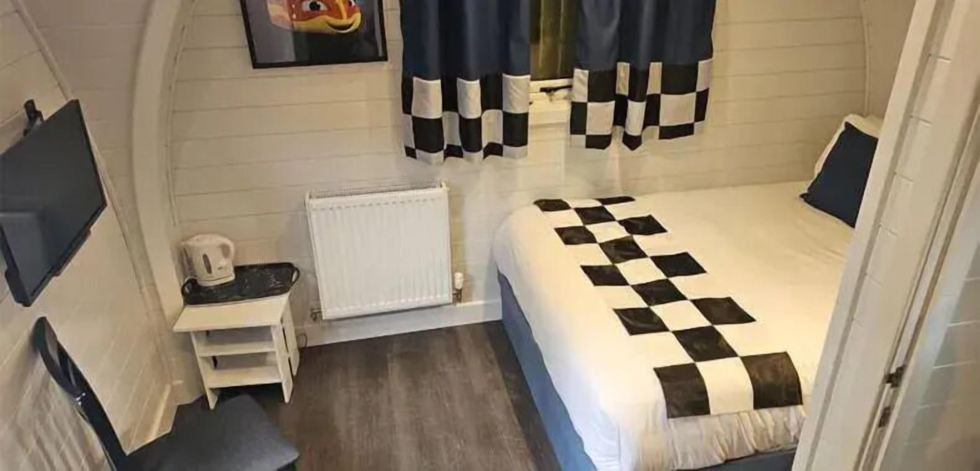 Premium bedding, blackout curtains, iron/ironing board, free WiFi