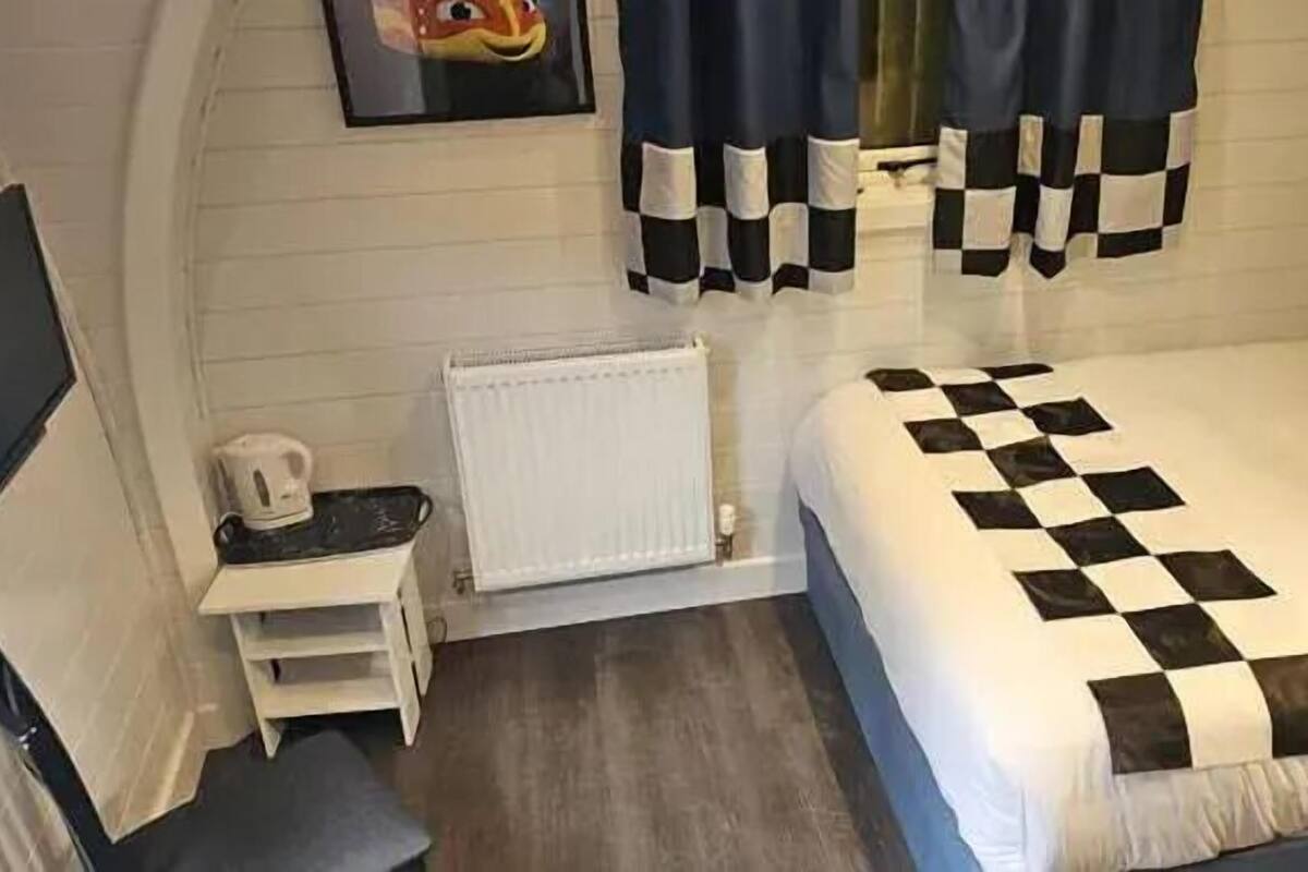 Premium bedding, blackout curtains, iron/ironing board, free WiFi