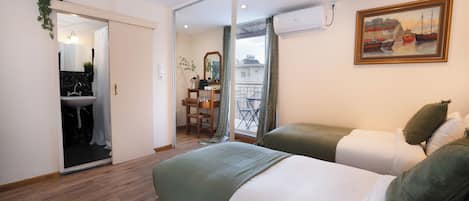 Blackout curtains, iron/ironing board (on request)