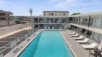 Seasonal outdoor pool, pool umbrellas, sun loungers