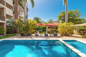 Outdoor pool, pool umbrellas, pool loungers