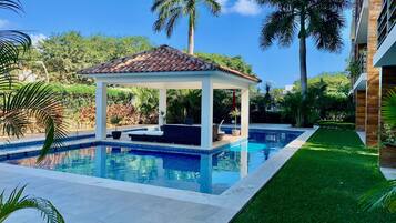 Outdoor pool, pool umbrellas, pool loungers