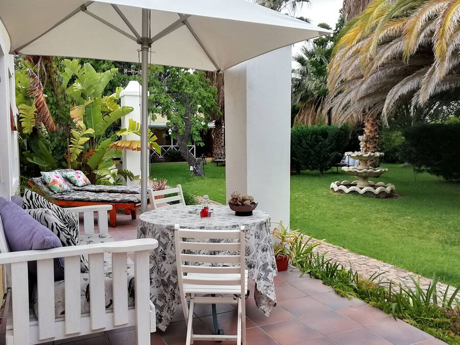 Suite with garden view | Terrace/patio