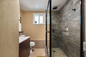 Shower, hair dryer, towels, soap