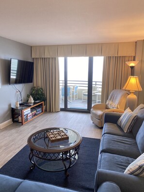 Smart TV, fireplace, DVD player, books