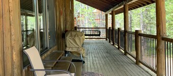 Porch lined cabin nestled in the Pines for lazy summer days