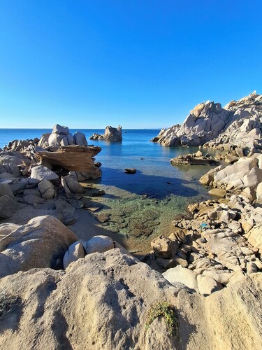 Charming beach front villa, private garden, sea view with breath-taking sunsets either from inside/outside the house