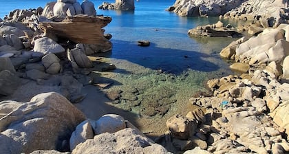 Charming beach front villa, private garden, sea view with breath-taking sunsets either from inside/outside the house