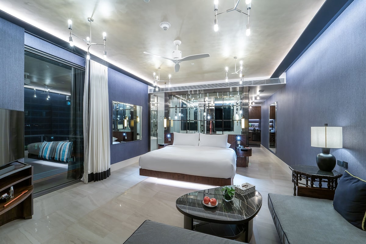 baba ocean suite corner | bathroom | separate bathtub and shower, rainfall showerhead, designer toiletries