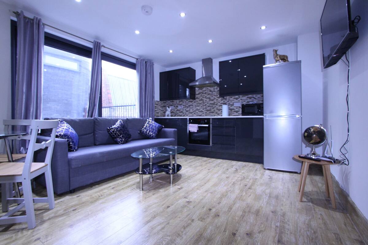 Apartamento superluxo | Área de estar | TV de tela plana