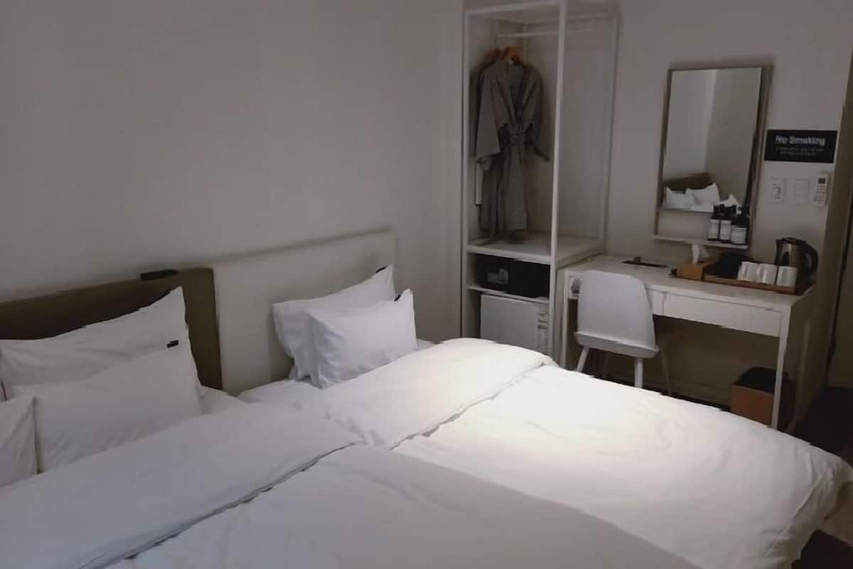 Desk, blackout curtains, soundproofing, iron/ironing board
