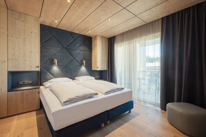 Suite, vista a la montaña | Ropa de cama hipoalergénica y caja de seguridad en la habitación 
