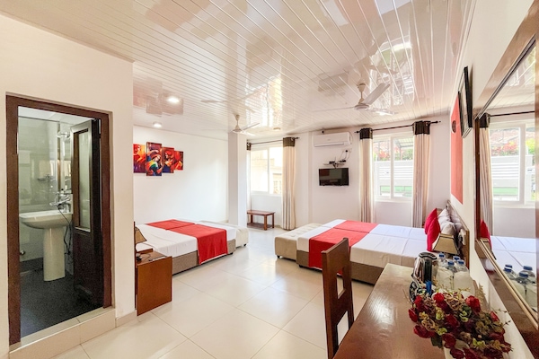 Chambre Quadruple Supérieure | Literie de qualité supérieure, matelas mémoire de forme