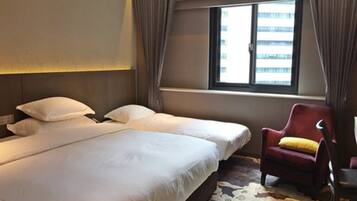 Triple Room | Free minibar, in-room safe, desk, blackout drapes