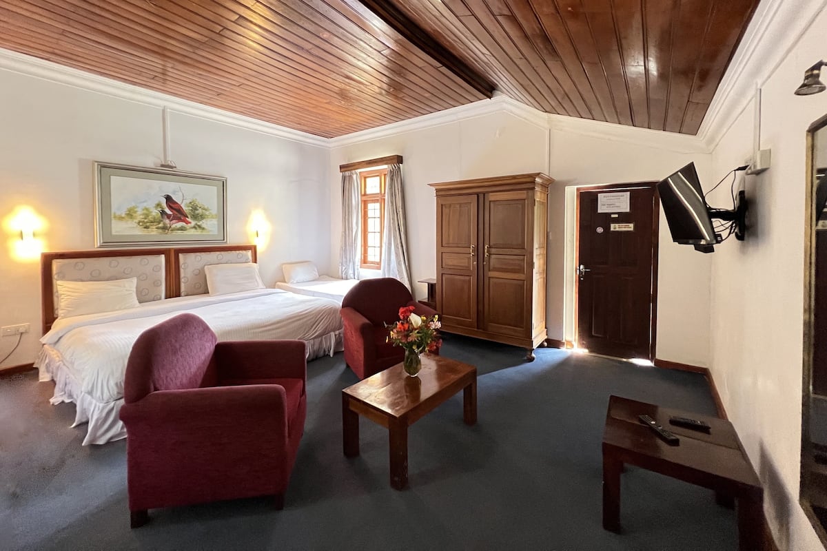 Kamar Triple Standar, 1 kamar tidur, pemandangan halaman, area halaman | Wi-Fi gratis dan seprai linen
