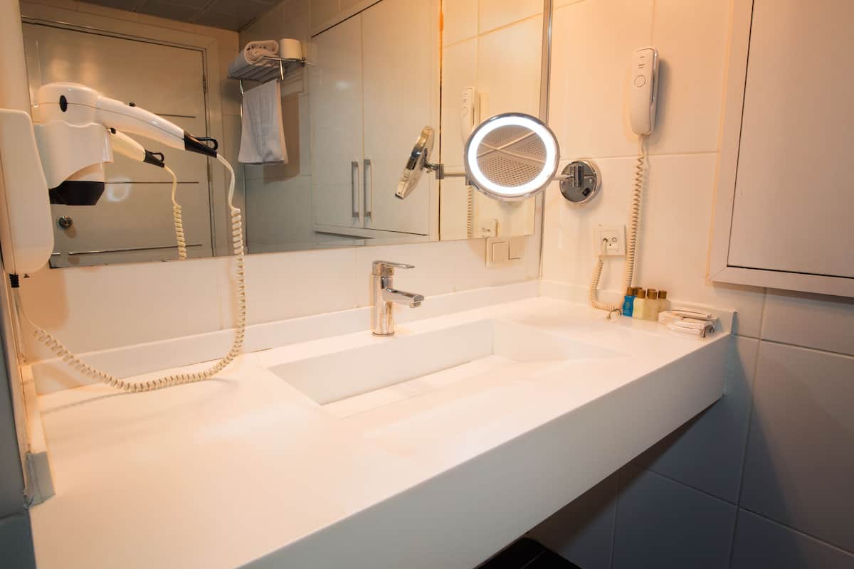 shower, rainfall showerhead, designer toiletries, hair dryer