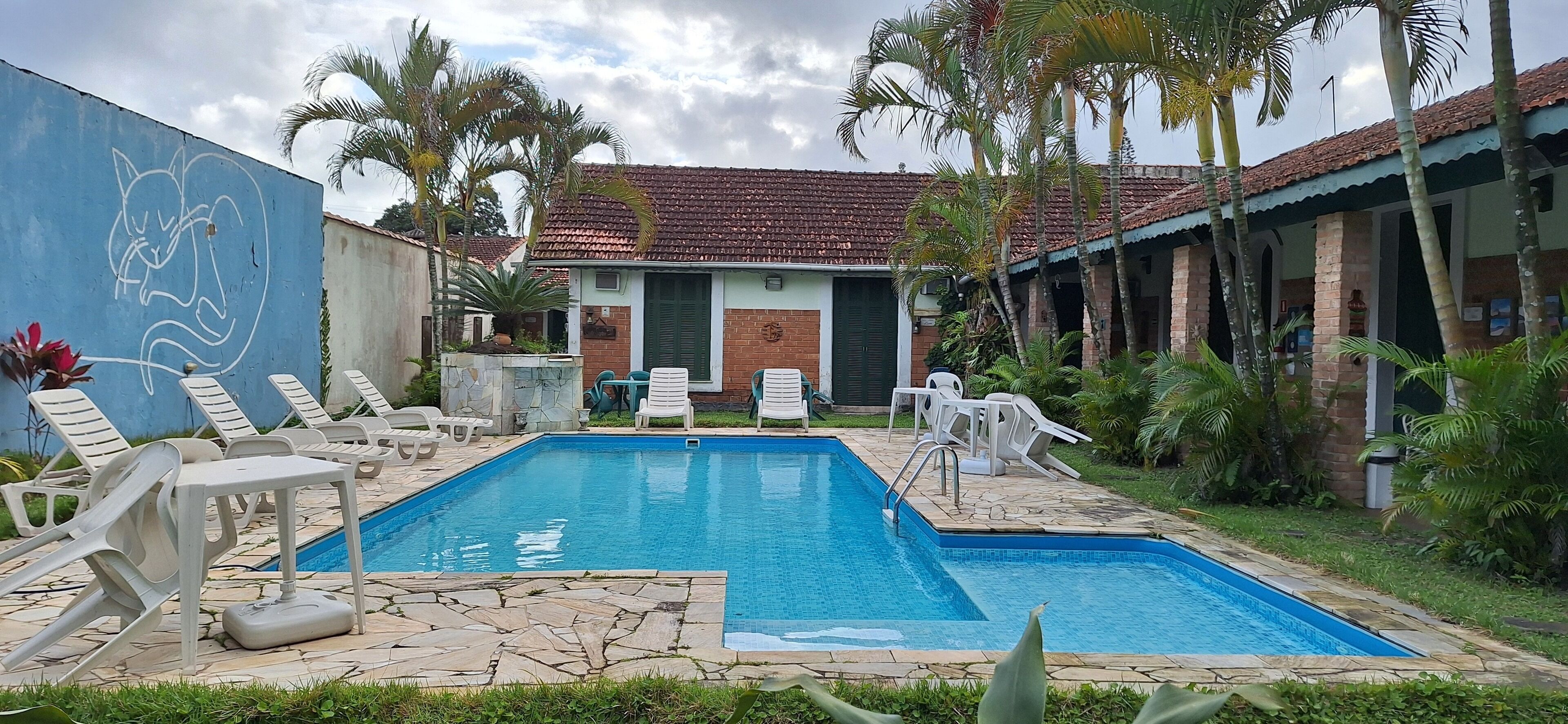 Outdoor pool, open 10:00 AM to 6:30 PM, pool umbrellas, pool loungers