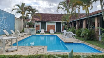 Outdoor pool, open 10:00 AM to 6:30 PM, pool umbrellas, sun loungers